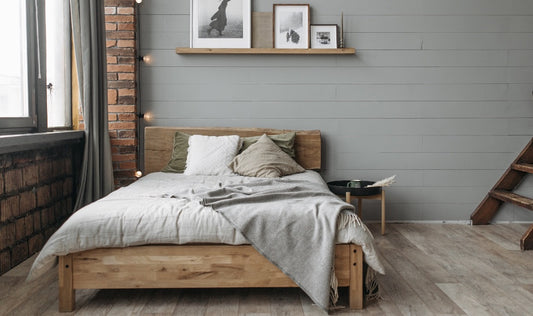 cosy bedroom with pictures on the wall