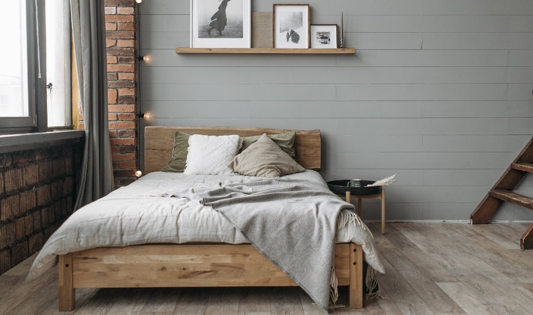 cosy bedroom with pictures on the wall