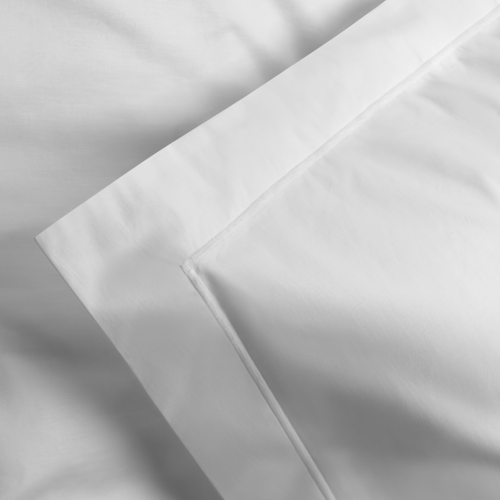 detail of white pillowcase