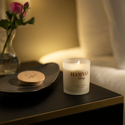 Hamvay-Láng candle on a table with flowers