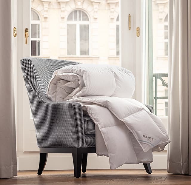 comforter on armchair