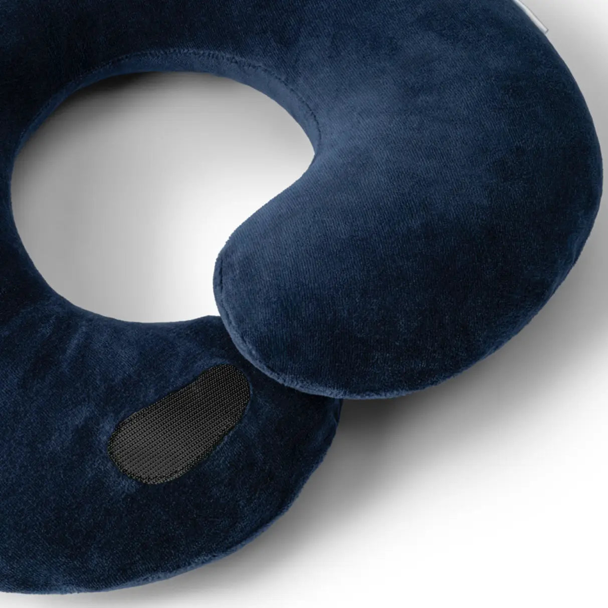 Blue travel neck pillow on a white background